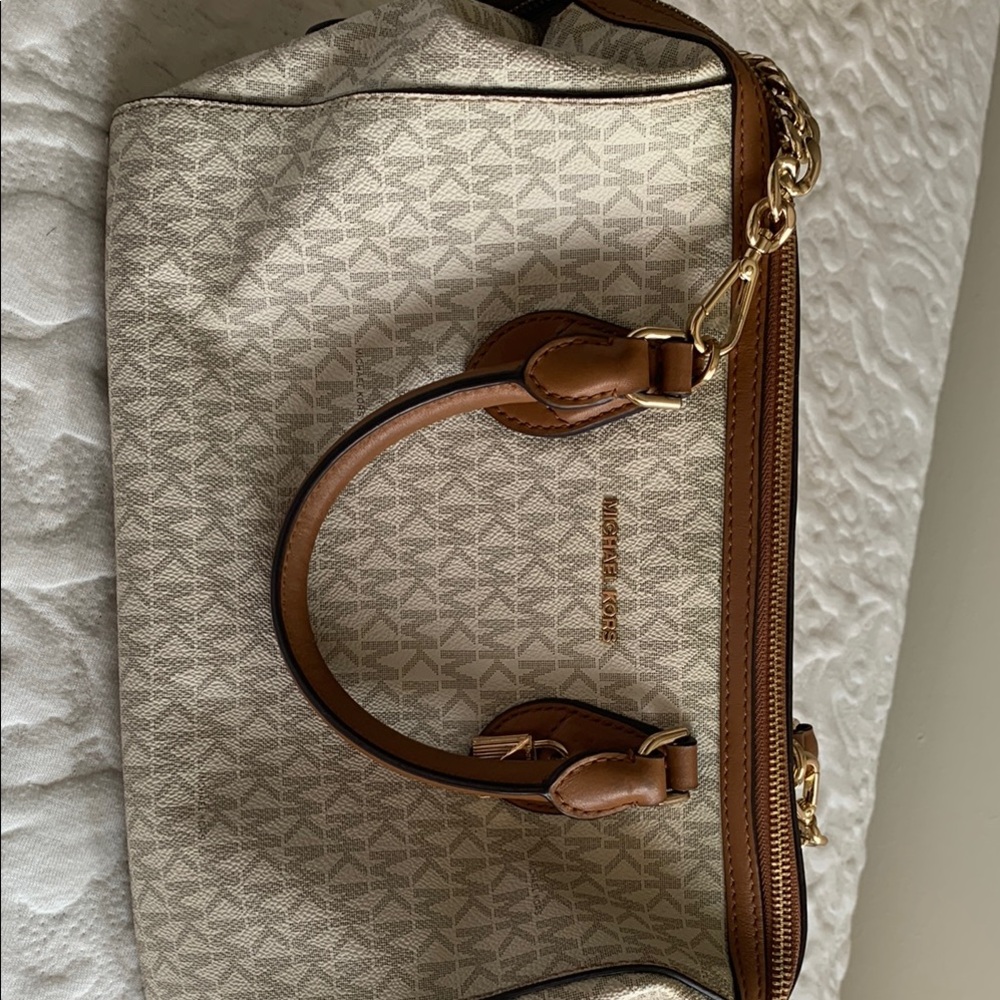 Very good condition convertible bag.